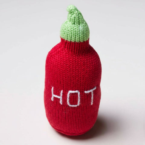 Knitted chili pepper toy with green top and 'HOT' text on a white background