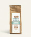 Kraft paper bag of Phoenicia Diner Buttermilk Pancake Mix on a white background
