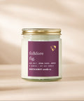 Candle jar labeled 'Folklore Fig' on a beige background