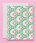 Greeting card with geometric pattern on a pink background