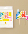 Colorful 'Happy Birthday' cake toppers with packaging on a white background