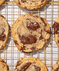 Chocolate chip cookies on a cooling rack
