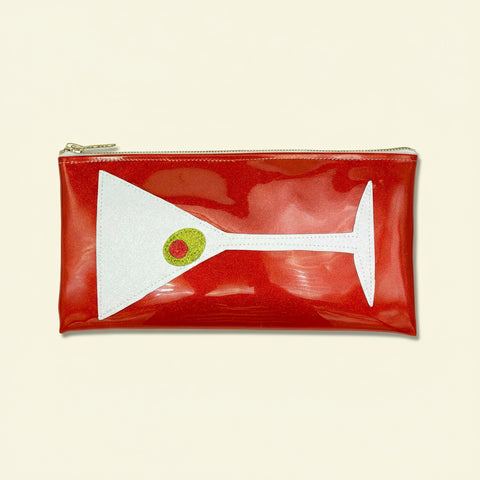 Red pouch with white design on a yellow background