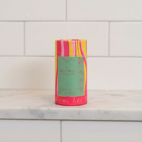 Cylindrical product with colorful label on a white background