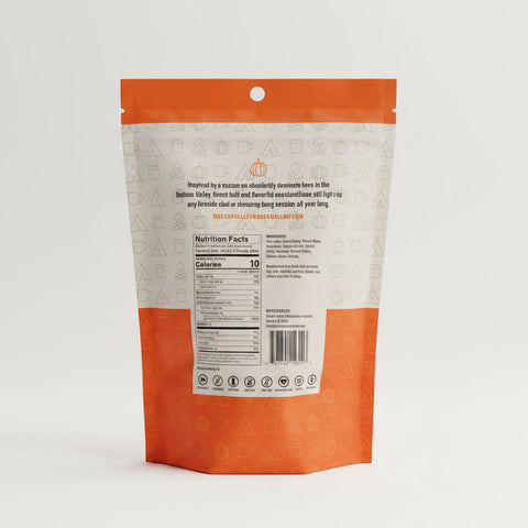 The back view of a stand-up pouch of Hudson Valley Marshmallow Co Pumpkin Spice Marshmallows showing the ingredients of the product.