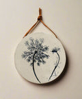 Round decorative wall hanging with queen annes lace design 