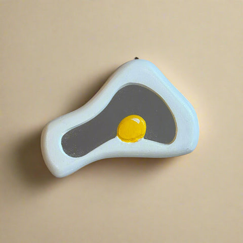 Mirror shaped like a fried egg