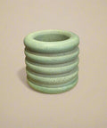 green ribbed match holder