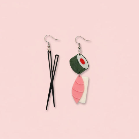 earrings in the shape of sushi and chop sticks