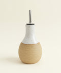 White and speckled brown clay ceramic oil dispenser 