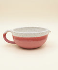 Red and white ceramic bowl