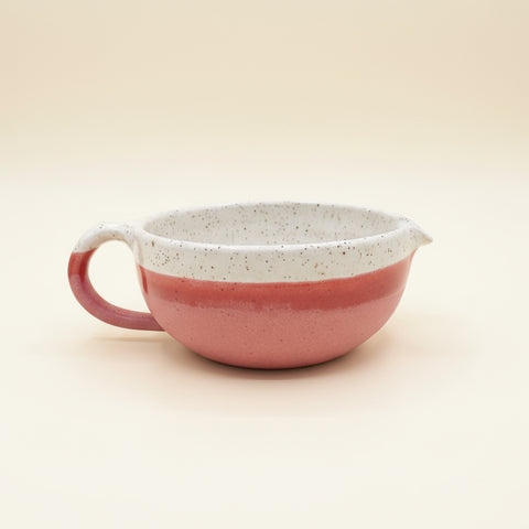 Red and white ceramic bowl