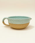 Light blue and speckled clay salad dressing bowl