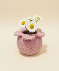 lavender ceramic flower-shaped vase