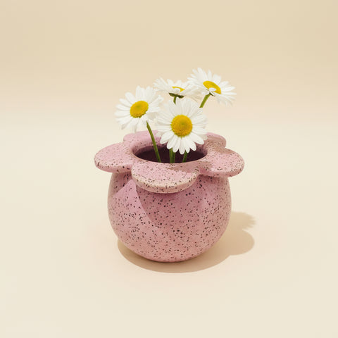 lavender ceramic flower-shaped vase