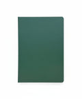 Green notebook on a wooden surface