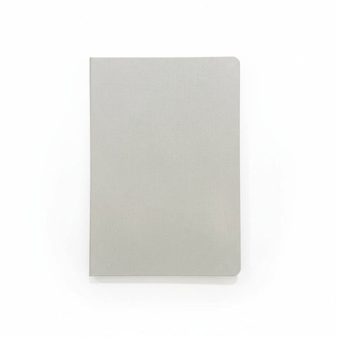 Gray notebook on a wooden surface
