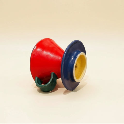 ceramic pour-over mug on a cream colored background