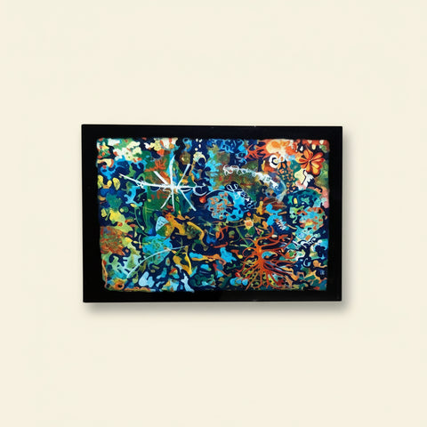 Colorful abstract painting on a wooden surface