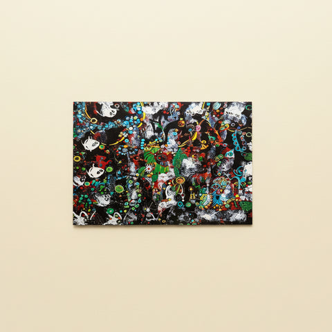 Colorful abstract art print on a wooden surface