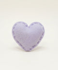 Heart-shaped lavender catnip toy on a white background