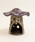mushroom-shaped ceramic luminary