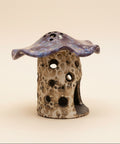 Mushroom-shaped ceramic luminary
