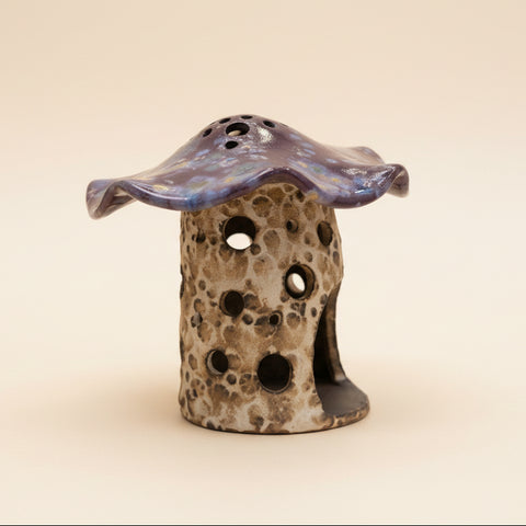 Mushroom-shaped ceramic luminary