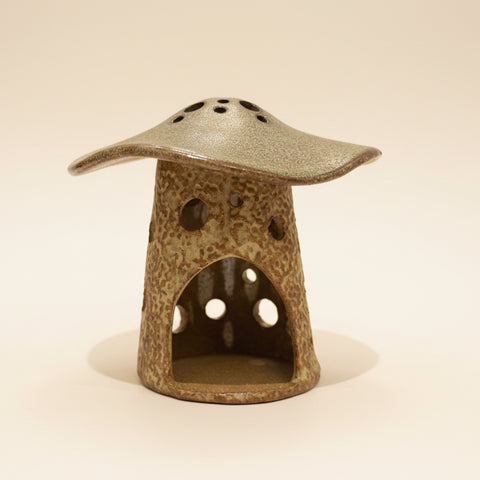 Ceramic mushroom-shaped luminary