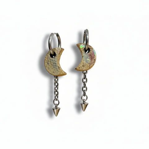 Pair of earrings with crescent moon designs and chain details