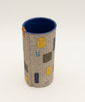 Textured vase with colorful patterns