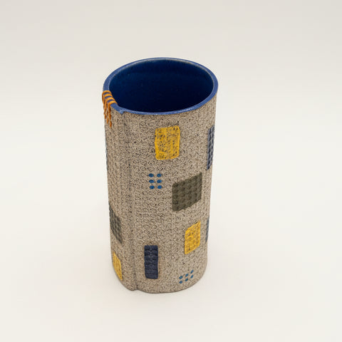 Textured vase with colorful patterns