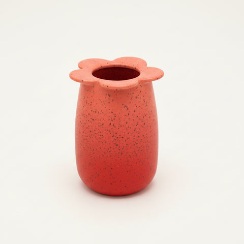 Red flower-shaped vase.
