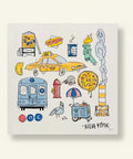 Illustrated New York City-themed artwork on a wooden surface
