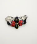 Colorful lantern fly-shaped wall art