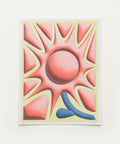 Abstract art print with geometric design on a wooden surface