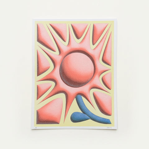 Abstract art print with geometric design on a wooden surface