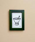 Small framed block print of a martini cocktail