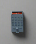 3d printed match holder shaped like a brownstone