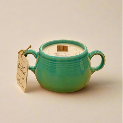 Teal ceramic candle