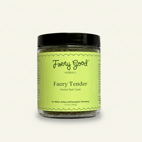 Jar of 'Faery Good' herbal bath soak on a cream colored background