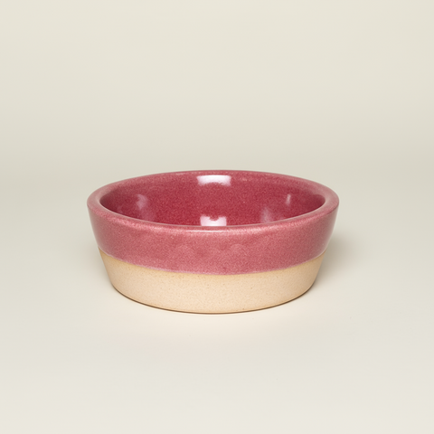 Ceramic bowl with a two-tone design on a gray background