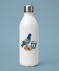 A die-cut sticker featuring a collage of a blue pigeon, a sandwich, and a coffee cup made from mixed paper textures, photographed on a light cream background.