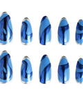 Blue nail art designs on a white background