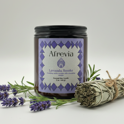 Candle with purple label featuring 'Afrevia' on a light gray background