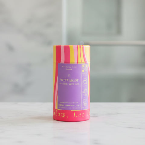 Colorful cylindrical product packaging with a label on a white background