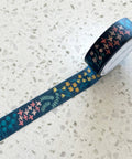 Decorative tape with floral pattern on a textured surface