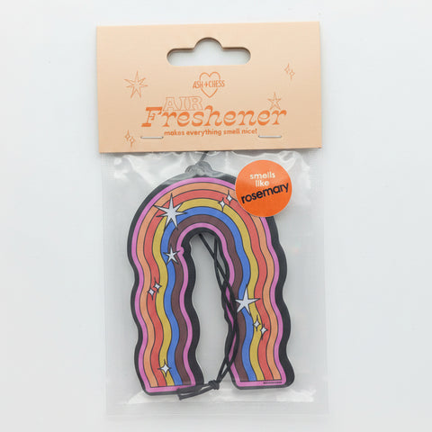 Air freshener with rainbow design on a blue background