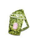 Compact mirror shaped like a matcha latte with a heart design on a white background