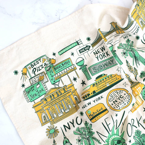Towel with New York-themed graphics on a white background